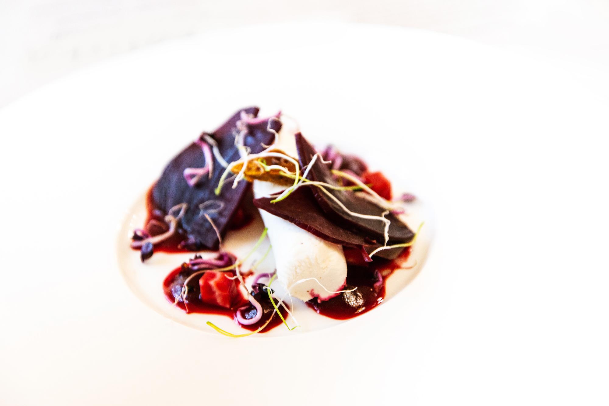 Close-up of plated appetizer with microgreens
